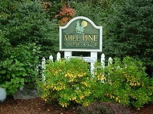 Mill Pine Village adult community welcome sign in Sandown, New Hampshire